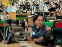 Stitchers manufacture suits at the Joseph Abboud manufacturing plant in New Bedford, MA.   [ PETER PEREIRA/THE STANDARD-TIMES/SCMG ]